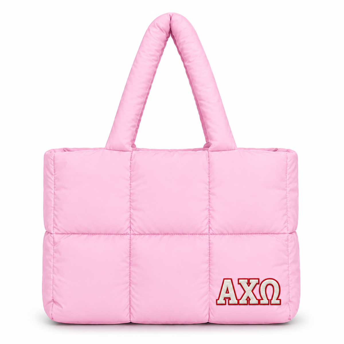 A light pink puffer-style tote bag with quilted square panels and two padded shoulder straps, featuring the Greek letters 'ΓΧΩ' in red with a white outline on the lower right front.