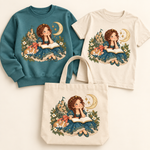Teal Princess Reading with Sleeping Corgi on coordinated sweatshirt, youth T-shirt, and natural canvas tote
